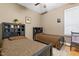 Bedroom with twin beds and leopard print bedding at 555 House Rd, Kenly, NC 27542