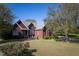 Brick house with a large yard and mature trees at 555 House Rd, Kenly, NC 27542