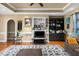 Living room with fireplace and built-in shelving at 555 House Rd, Kenly, NC 27542