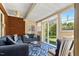 Sunroom with brick wall and access to backyard at 555 House Rd, Kenly, NC 27542