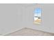 Well lit bedroom with carpet and a window with a view at 60 Marley Way, Dunn, NC 28334