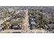 An aerial view highlights neighborhood street and tree lined landscape, emphasizing a residential setting at 835 Sunset Ave, Rocky Mount, NC 27804