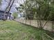 Newly constructed wooden fence enclosing the property's backyard, providing privacy at 835 Sunset Ave, Rocky Mount, NC 27804