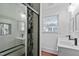 Updated bathroom with double vanity, walk-in shower, and modern fixtures at 835 Sunset Ave, Rocky Mount, NC 27804
