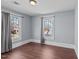 Charming bedroom with hardwood floors and gray walls at 835 Sunset Ave, Rocky Mount, NC 27804
