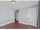 Spacious bedroom with hardwood floors and gray walls at 835 Sunset Ave, Rocky Mount, NC 27804