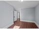 Spacious bedroom with hardwood floors and gray walls at 835 Sunset Ave, Rocky Mount, NC 27804