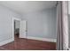Spacious bedroom with hardwood floors and neutral walls at 835 Sunset Ave, Rocky Mount, NC 27804