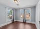 Sunny bedroom with hardwood floors and gray walls at 835 Sunset Ave, Rocky Mount, NC 27804