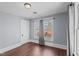 Bright bedroom with hardwood floors and gray walls at 835 Sunset Ave, Rocky Mount, NC 27804
