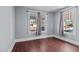 Well-lit bedroom with hardwood floors and ample natural light at 835 Sunset Ave, Rocky Mount, NC 27804
