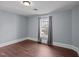 Bright bedroom with hardwood floors and ample natural light at 835 Sunset Ave, Rocky Mount, NC 27804