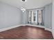 Bright dining room with hardwood floors and a modern light fixture at 835 Sunset Ave, Rocky Mount, NC 27804