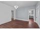 Spacious dining area features hardwood floors and views into the kitchen at 835 Sunset Ave, Rocky Mount, NC 27804