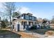 Two-story Craftsman home with gray siding, white trim, and a front porch at 835 Sunset Ave, Rocky Mount, NC 27804