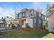 Two-story Craftsman home with gray siding, white trim, and a front porch at 835 Sunset Ave, Rocky Mount, NC 27804
