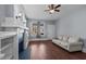 Living room with hardwood floors, fireplace, and built-in shelving at 835 Sunset Ave, Rocky Mount, NC 27804