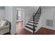 Elegant staircase with dark wood and metal railing at 835 Sunset Ave, Rocky Mount, NC 27804