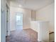 Upstairs hallway with carpet and access to other rooms at 851 Parc Townes Dr # 10, Wendell, NC 27591