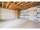 Unfinished basement with exposed ceiling and walls ready for customization at 865 Parc Townes Dr # 4, Wendell, NC 27591