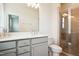 Beautiful bathroom with double sinks, a large mirror, and a glass-enclosed shower at 865 Parc Townes Dr # 4, Wendell, NC 27591