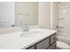 Bathroom features white countertop, gray vanity, and bath tub with shower at 865 Parc Townes Dr # 4, Wendell, NC 27591