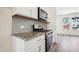 Kitchen featuring granite countertops, stainless steel appliances and a large island at 865 Parc Townes Dr # 4, Wendell, NC 27591