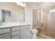 Bathroom featuring a double sink vanity, glass shower, and tile flooring at 867 Parc Townes Dr # 3, Wendell, NC 27591