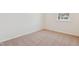 Bright bedroom features neutral carpet and white walls, creating a clean and modern space at 867 Parc Townes Dr # 3, Wendell, NC 27591
