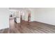 Open-concept living space boasts hardwood floors, a spacious layout, and ample natural light for comfortable living at 867 Parc Townes Dr # 3, Wendell, NC 27591
