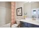 Main bathroom with tub shower, vanity, and modern decor at 871 Parc Townes Dr # 1, Wendell, NC 27591