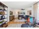 Bright living room featuring a comfortable sectional sofa and large TV at 871 Parc Townes Dr # 1, Wendell, NC 27591