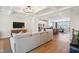 Open living space with hardwood floors and a view into kitchen at 871 Parc Townes Dr # 1, Wendell, NC 27591