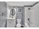 Charming bathroom offers a modern sink vanity, updated fixtures, and a tub-shower combination at 1004 N Fayetteville Ave, Dunn, NC 28334