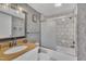 Bathroom with updated vanity and shower/tub at 1004 N Fayetteville Ave, Dunn, NC 28334