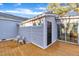 Wooden deck with access to a shed and sliding glass doors at 1004 N Fayetteville Ave, Dunn, NC 28334