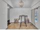 Dining room showcasing tile floor, neutral walls and natural light from a nearby window at 1004 N Fayetteville Ave, Dunn, NC 28334