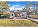 Recently updated cottage, featuring a welcoming front porch and landscape at 1004 N Fayetteville Ave, Dunn, NC 28334