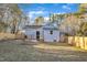 Back of house with fenced yard and wooden deck at 1004 N Fayetteville Ave, Dunn, NC 28334