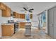 Bright kitchen with oak cabinets, subway tile backsplash, and stainless steel appliances at 1004 N Fayetteville Ave, Dunn, NC 28334
