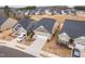 Aerial view of a new neighborhood showcasing modern homes and well-maintained landscaping at 1008 Ashton Oak Ct, Durham, NC 27703