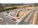 Aerial view of the community gardens, playground, manicured grounds, and ample parking at 1008 Ashton Oak Ct, Durham, NC 27703