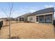 Lovely home features a relaxing covered patio, privacy fence and meticulously maintained lawn at 1008 Ashton Oak Ct, Durham, NC 27703