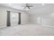Spacious bonus room with neutral carpet, lots of light, ceiling fan, and a vaulted ceiling at 1008 Ashton Oak Ct, Durham, NC 27703