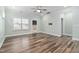 Spacious living room with a ceiling fan and a back door at 1008 Ashton Oak Ct, Durham, NC 27703