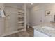 Bathroom with walk-in shower, granite countertop vanity, and updated fixtures at 1741 Old Fields Blvd, Haw River, NC 27258