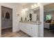 Double vanity bathroom with granite countertop and walk-in closet at 1741 Old Fields Blvd, Haw River, NC 27258