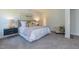 Spacious bedroom with king-size bed, nightstands, and a relaxing atmosphere at 1741 Old Fields Blvd, Haw River, NC 27258
