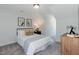 Comfortable bedroom with a queen-size bed and dresser at 1741 Old Fields Blvd, Haw River, NC 27258