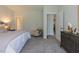 Main bedroom with a view of the bathroom and an additional sitting area at 1741 Old Fields Blvd, Haw River, NC 27258